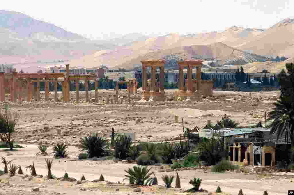 FILE - This file photo released on Sunday, May 17, 2015, by the Syrian official news agency SANA, shows the general view of the ancient Roman city of Palmyra, northeast of Damascus, Syria.