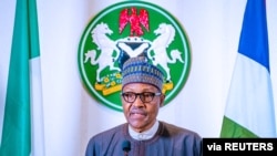 Nigerian President Muhammadu Buhari addresses the nation on the coronavirus disease (COVID-19), in Abuja, March 29, 2020.