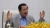 FILE: Cambodia's Prime Minister Hun Sen gestures during a speech on the current state of a new virus from China in Phnom Penh, Cambodia, Thursday, Jan. 30, 2020. (AP Photo/Heng Sinith)