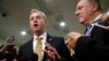 Acting Defense Secretary Patrick Shanahan, left, speaks to members of the media alongside Secretary of State Mike Pompeo after a classified briefing for members of Congress on Iran, on Capitol Hill in Washington, May 21, 2019. 