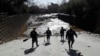 California Search Crews Look for Bodies in the Ooze