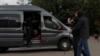 Law enforcement officers detain a journalist in central Minsk, Belarus, August 27, 2020.