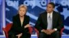 FILE - Then-Sen. Hillary Clinton, D-N.Y., answers a question alongside then-Sen. Barack Obama, D-Ill., during a presidential primary debate in Manchester, N.H., June 3, 2007. Obama formally endorsed Clinton's 2016 White House bid on June 9. 