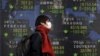 Asia Markets Slide Downward Again on Falling Oil Prices