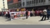 FILE - "President Robert Mugabe must go!" shouted protesters. The opposition accuses the 92-year-old leader of ruining the once vibrant economy of Zimbabwe and disregarding human rights. (S. Mhofu/VOA)