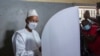 FILE - Guinean opposition leader Cellou Dalein Diallo votes in Conakry, Oct. 18, 2020.
