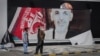 A Year on, Ex-Afghan Leader Ghani Defends Role in Taliban Takeover
