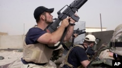 Para kontraktor militer AS yang bekerja untuk perusahaan Blackwater dalam Perang Irak (foto: ilustrasi). 