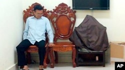 Former opposition leader Kem Sokha sits at the appeals court during the hearing of a bail application in Phnom Penh, Cambodia, Feb. 1, 2018.