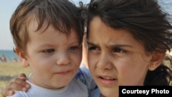 Manar Qarra, general manager of Selam Orphanage in Gaziantep, Turkey, snapped this photo of two children from the orphange during a trip to the beach.