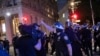 FILE - A police officer shouts at a video journalist in New York City, June 2, 2020, during demonstrations protesting the death in Minneapolis police custody of George Floyd.