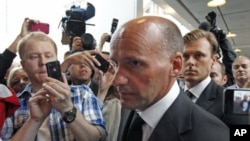 Geir Lippestad, lawyer of Norwegian Anders Behring Breivik, the man accused of a killing spree and bomb attack in Norway, arrives at court in Oslo, Norway, July 25, 2011