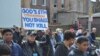 Participants march for peace in a prayer walk, April 14, 2017, through one Chicago neighborhood hit hard by gun violence, the Englewood neighborhood on Chicago's South Side. 