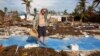 Billy “The Kid” Quinn, 48, assesses the damage atop a blue slab where his home used to be in Islamorada's Seabreeze Trailer Park. (R. Taylor/VOA)