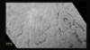 Scientists Puzzle Over Pluto's Polygons