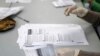 ARCHIVO - Boletas para las elecciones generales de EEUU procesadas en Oregon City, Oregon, el 7 de noviembre de 2024. 