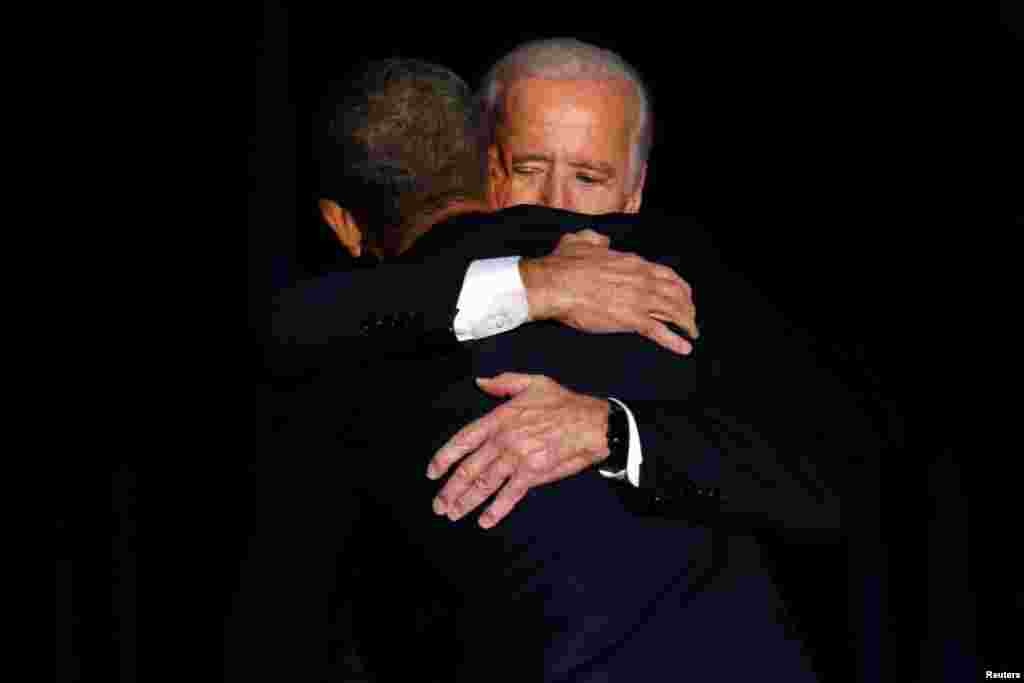 U.S. President Barack Obama is joined onstage by Vice President Joe Biden after his farewell address in Chicago, Illinois, Jan. 10, 2017.