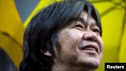 FILE - Lawmaker "Long Hair" Leung Kwok-hung. Leung Kwok-hung is accused of taking $32,000 from Jimmy Lai, founder of Apple Daily newspaper.