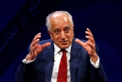 FILE - US envoy for peace in Afghanistan Zalmay Khalilzad speaks during a debate at Tolo TV channel in Kabul, Afghanistan, April 28, 2019.