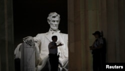 FILE - Security personnel are pictured at the Lincoln Memorial in Washington, Oct. 1, 2013.