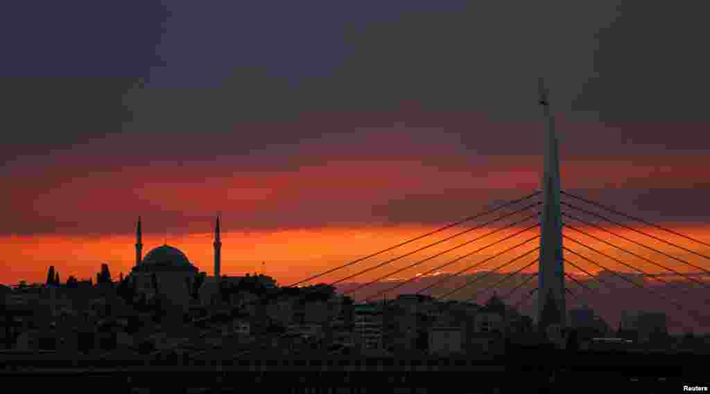 The sun sets over the Golden Horn in Istanbul, Turkey.