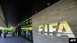 FILE - FIFA (International Football Federation Association) outside the organization's headquarters in Zurich.