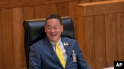 Thailand's Prime Minister Srettha Thavisin reacts before he reads the policy statement at Parliament in Bangkok, Thailand, Sept. 11, 2023. Srettha appeared before Parliament for the first time to explain how his government envisions will improve the country. 