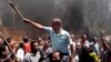 Egyptians chant slogans during clashes between supporters and opponents of Egypt's president and his Muslim Brotherhood in Luxor, June 19, 2013.