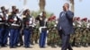 Djibouti's President Ismael Guelleh inspects a guard of honour during his inauguration on May 8, 2016 in Djibouti after his fourth re-election. 