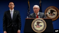 Attorney General Jeff Sessions, joined by Deputy Attorney General Rod Rosenstein, left, speaks news conference at the Attorney's Office for the District of Columbia in Washington, Oct. 15, 2018, to announce on efforts to reduce transnational crime.