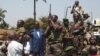 Central African Republic President Francois Bozize (C) speaks to a crowd of supporters and anti-rebel protesters during an appeal for help, in Bangui, Central African Republic, December 27, 2012.