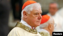 Cardinal Gerhard Mueller attends the Chrism Mass on Holy Thursday during which sacred oils are blessed at Saint Peter's Basilica at the Vatican, March 29, 2018.