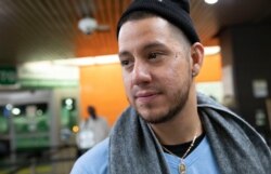 Martín Batalla Vidal waits in line at the Port Authority Bus Terminal in New York to take a bus to Washington, Monday, Nov. 11, 2019. Vidal is a lead plaintiff in one of the cases to preserve the Obama-era program known as DACA.