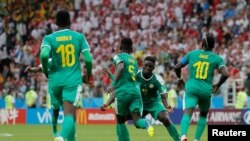 Les joueurs du Sénégal célèbrent leur premier but contre la Pologne, le 19 juin 2018.