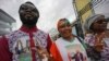 Des partisans de l'ancien président de la Côte d'Ivoire, Laurent Gbagbo, se rassemblent à l'aéroport international de Bruxelles, jeudi 17 juin 2021.