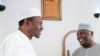 Nigeria's President Muhhamadu Buhari (L) is joined by former Vice President Alhaji Atiku Abubakar as they attend the Jumaat Prayers after Alhaji Atiku Abubakar returned from medical treatment overseas, in Abuja, Nigeria. Buhari's cabinet is finally being 