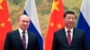 Presiden China Xi Jinping (kanan) dan Presiden Rusia Vladimir Putin menjelang pembicaraan mereka di Beijing, China, Jumat, 4 Februari 2022. (Alexei Druzhinin, Sputnik, Kremlin Pool Foto via AP)