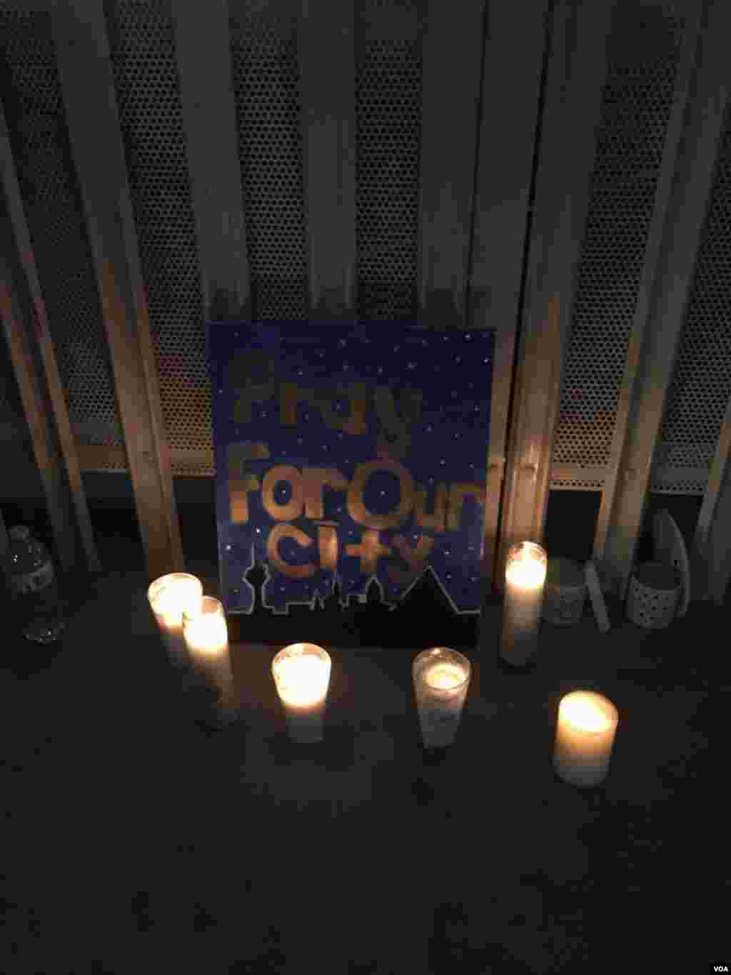 A sign seen at the candlelight vigil in honor of the victims of the Las Vegas mass shooting, Oct. 2, 2017. (Photo: C. Mendoza / VOA)