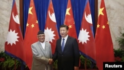 བལ་ཡུལ་གྱི་སྲིད་བློན་ཁེ་པི་ཤར་མ་ཨོ་ལི་དང་རྒྱ་ནག་གི་འགོ་ཁྲིད་ཞིས་ཅིན་ཕིང་