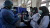 An International Program Prepares to Deploy Coronavirus Vaccine to Millions