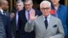 FILE - Roger Stone, an associate of President Donald Trump, leaves the U.S. District Court, after a court status conference on his seven charges: one count of obstruction of an official proceeding, five counts of false statements, and one count of witness tampering.