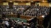 Egyptian President Mohamed Mursi delivers a speech to the Shura Council, or upper house of parliament, in Cairo, December 29, 2012. 