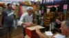 Polls close in Uruguay's election, with ruling coalition, opposition headed for photo finish 