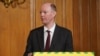 FILE - Britain's Chief Medical Officer for England Chris Whitty attends a remote press conference to update the nation on the COVID-19 pandemic, inside 10 Downing Street in central London on June 10, 2020.