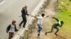 Dozens of Migrants 'Storm' Tunnel Between UK, France
