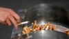China's Cigarette Sales Fall Slightly After Tobacco Tax 