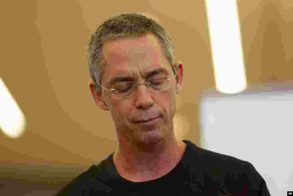 Gilad Sharon, son of the former Israeli Prime Minister Ariel Sharon announces his father's death at the Sheba Medical Center near Tel Aviv, Israel, Jan. 11, 2014.