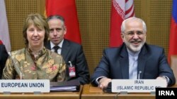 محمد جواد ظریف و کاترین اشتون در مذاکرات هسته ای ایران و ۱+۵ در وین - ۲۴ خرداد ۱۳۹۳ 