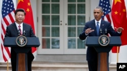 Presiden Barack Obama dan Presiden China Xi Jinping dalam konferensi pers gabungan, 25 September 2015, di Rose Garden, Gedung Putih, Washington.