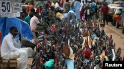 FILE - Bags are arranged for sale along a road at the Mokolo main market in Yaounde, the capital of Cameroon.